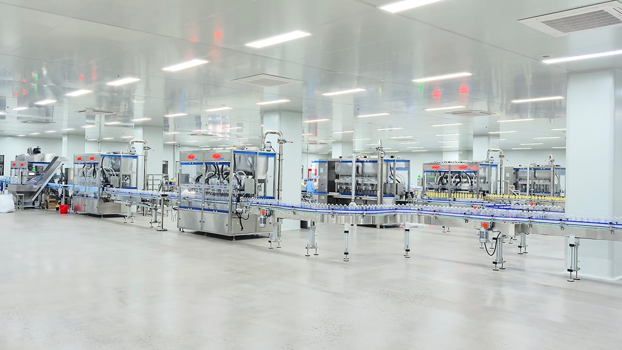 Six-Head Gear Pump Filling Machine, Ten-Head Continuous Cap-Securing Machine, Case Packer, Sealing Machine, Box Labeling Machine, Robot Palletizing Machine Project Site (2)